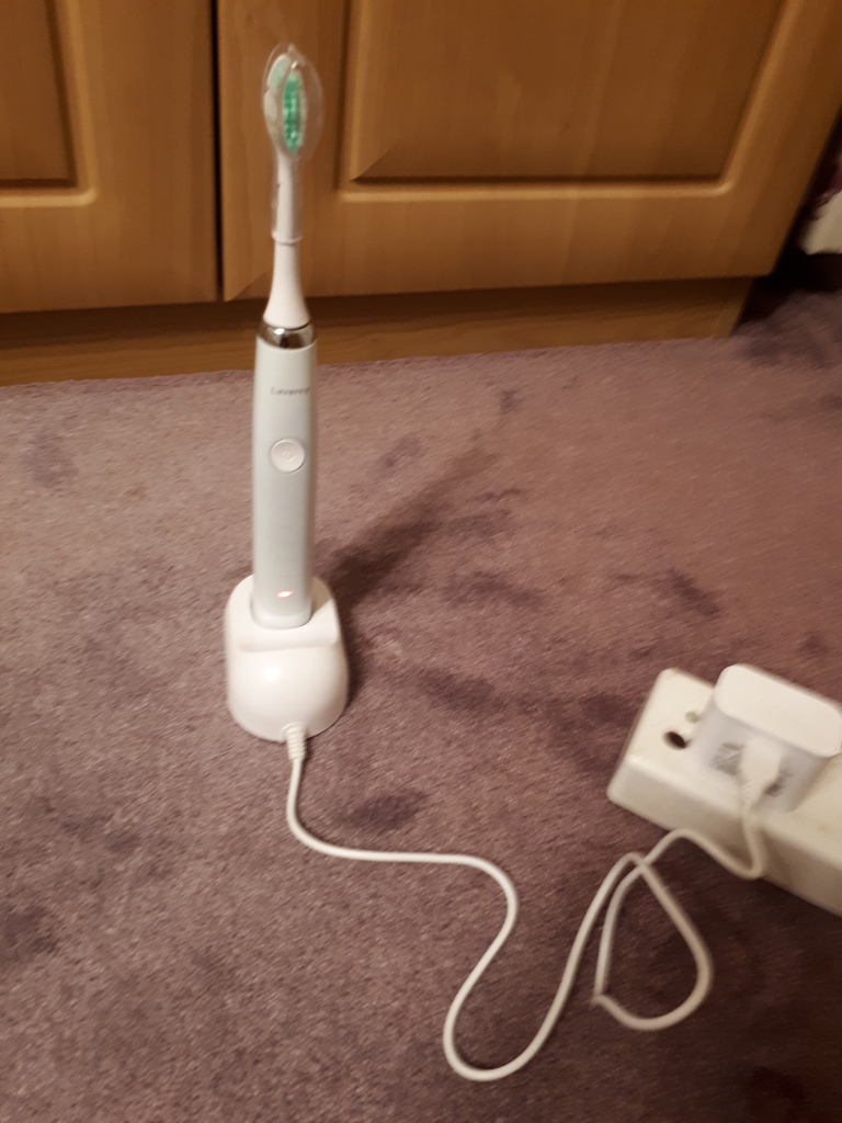 Sonic tooth-brush with USB plug